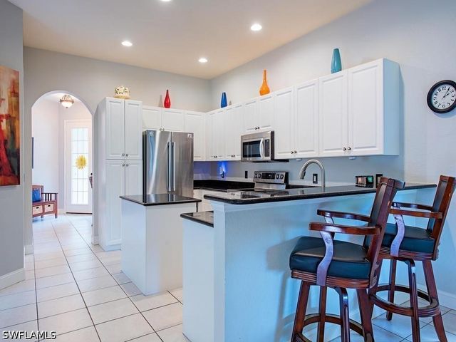 5013 Fairhaven LN, Naples, FL 34109