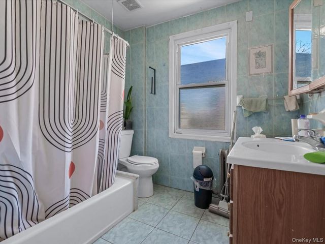 38-19 219th Street, Bayside, NY 11361