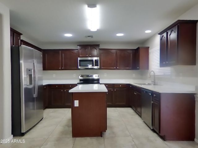 11590 W PURDUE Avenue, Youngtown, AZ 85363