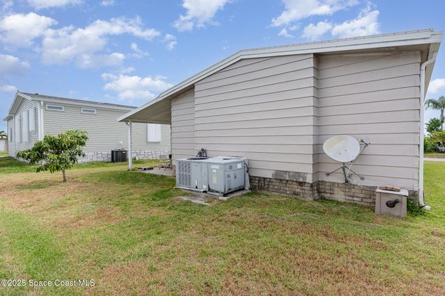 637 Wedelia Drive, Barefoot Bay, FL 32976