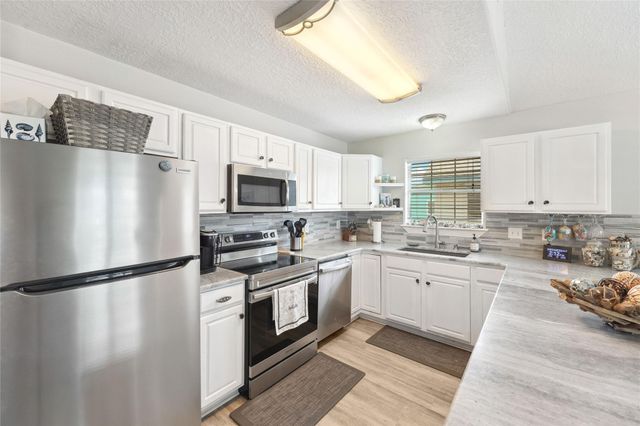 214 Sand Dune Court, Surfside Beach, TX 77541