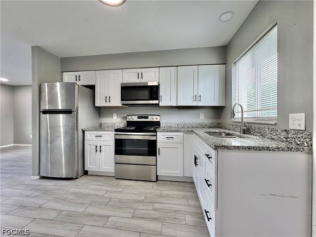 142 Harry AVE S, Lehigh Acres, FL 33973