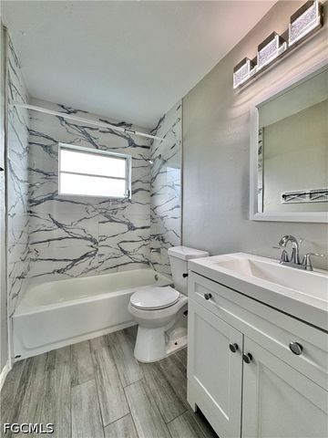 142 Harry AVE S, Lehigh Acres, FL 33973