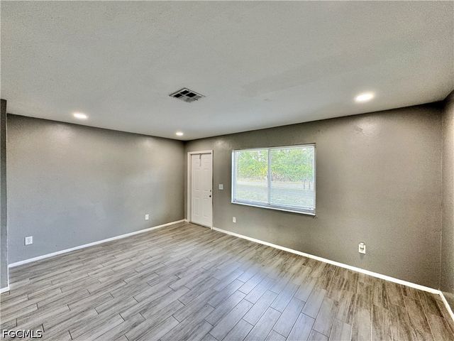 142 Harry AVE S, Lehigh Acres, FL 33973