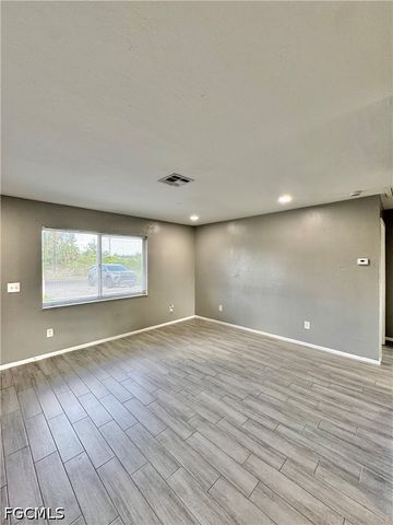 142 Harry AVE S, Lehigh Acres, FL 33973