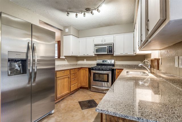 8331 Lullwater Drive, Dallas, TX 75218