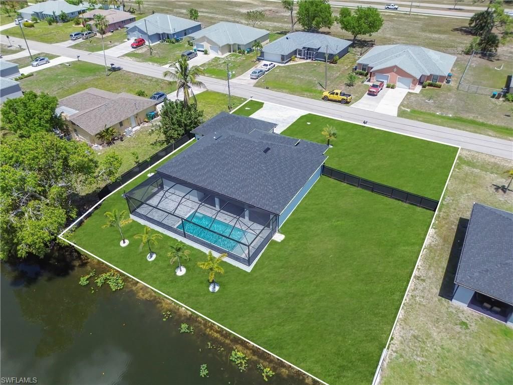 329 26th PL, CAPE CORAL, FL 33991 — photo 2