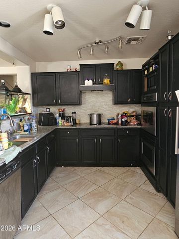11574 W VOGEL Avenue, Youngtown, AZ 85363