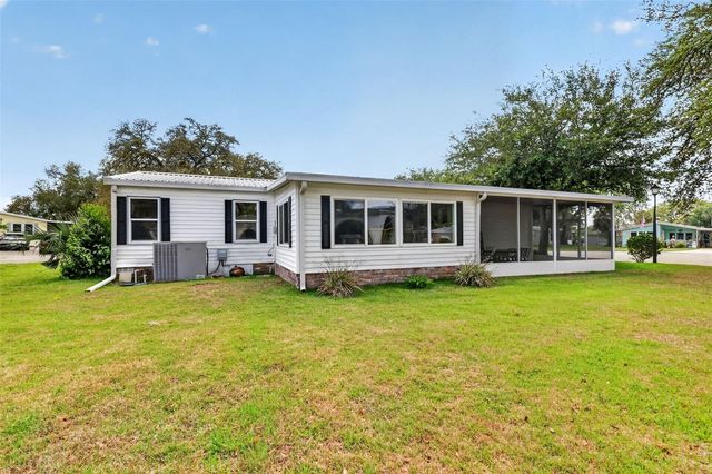 705 DEVON DRIVE, Lady Lake, FL 32159