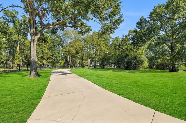11410 Outpost Cove Drive, Willis, TX 77318