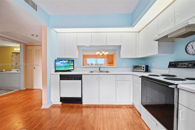 13701 SW 12th St 202A, Pembroke Pines, FL 33027