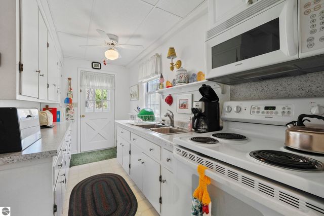 5882 Crystal Beach Road, Rapid City, MI 49676