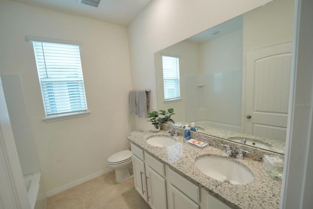 6946 AUDOBON OSPREY COVE, Harmony, FL 34773