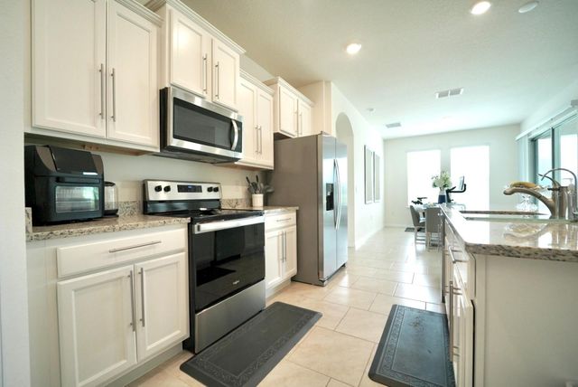 6946 AUDOBON OSPREY COVE, Harmony, FL 34773