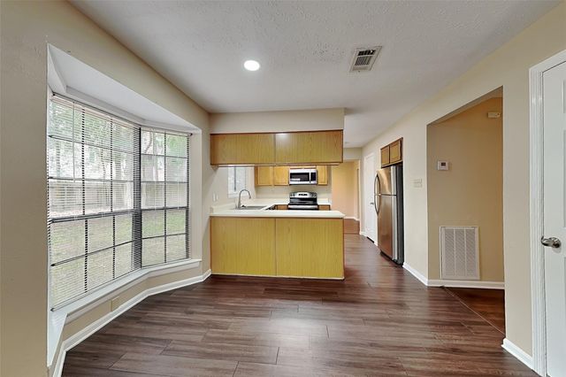 15 Kearny Brook Place, Spring, TX 77381
