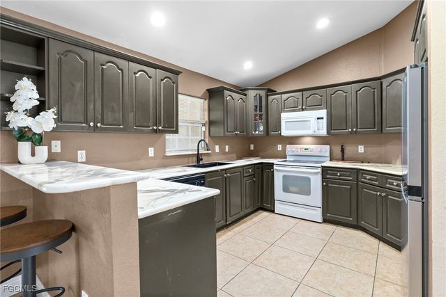 1019 Carroll ST E, Lehigh Acres, FL 33974