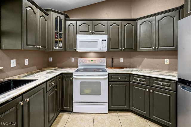 1019 Carroll ST E, Lehigh Acres, FL 33974