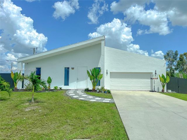 395 Pace Avenue, Lehigh Acres, FL 33974