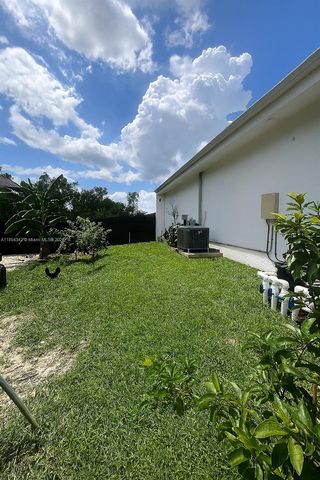 395 Pace Avenue, Lehigh Acres, FL 33974