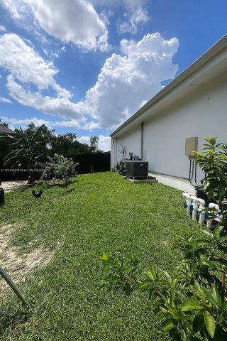395 Pace Avenue, Lehigh Acres, FL 33974