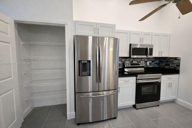 1440 GRAHAM CIR 1440, Lehigh Acres, FL 33936