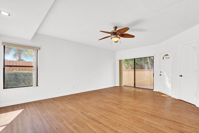 52 Uno Lago Drive, Juno Beach, FL 33408