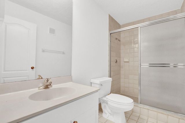 52 Uno Lago Drive, Juno Beach, FL 33408