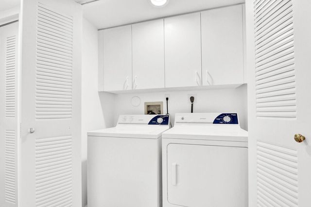 52 Uno Lago Drive, Juno Beach, FL 33408