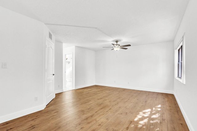 52 Uno Lago Drive, Juno Beach, FL 33408