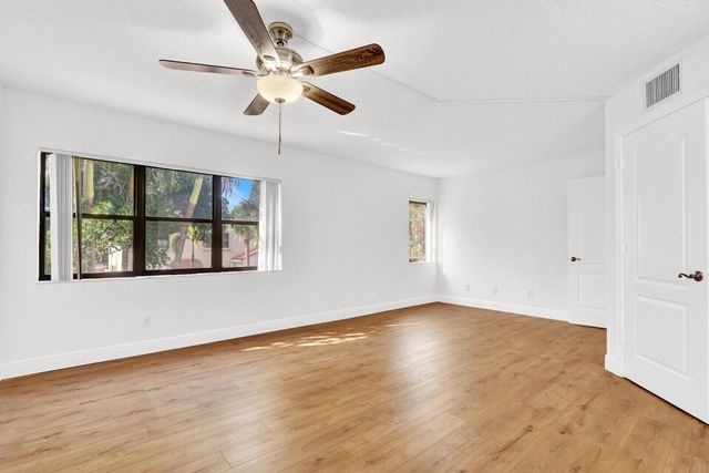 52 Uno Lago Drive, Juno Beach, FL 33408