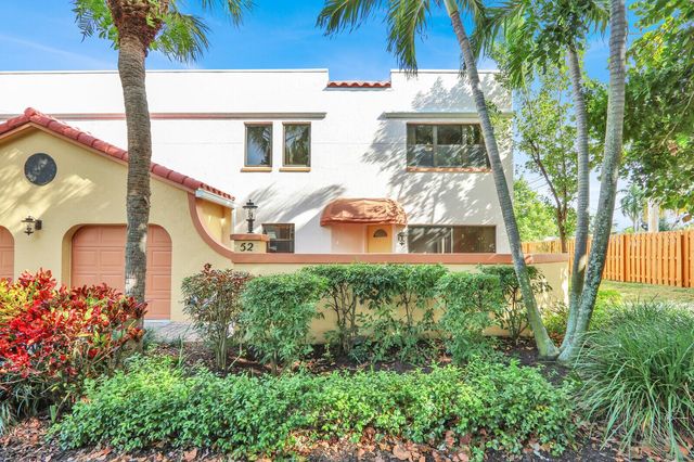 52 Uno Lago Drive, Juno Beach, FL 33408