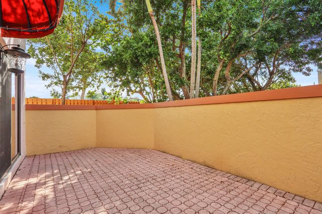 52 Uno Lago Drive, Juno Beach, FL 33408