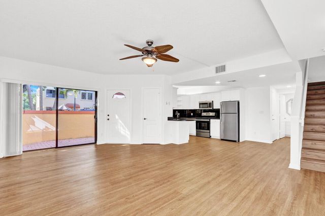 52 Uno Lago Drive, Juno Beach, FL 33408