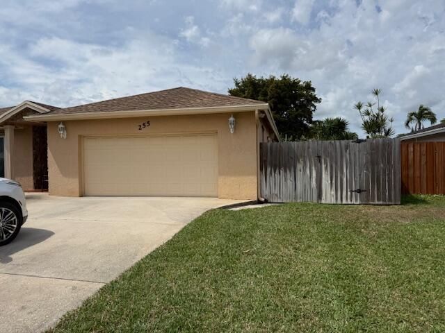 255 Sandpiper Avenue, Royal Palm Beach, FL 33411