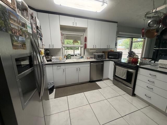 255 Sandpiper Avenue, Royal Palm Beach, FL 33411