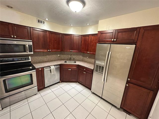 3360 Spanish Moss Terrace 203, Lauderhill, FL 33319