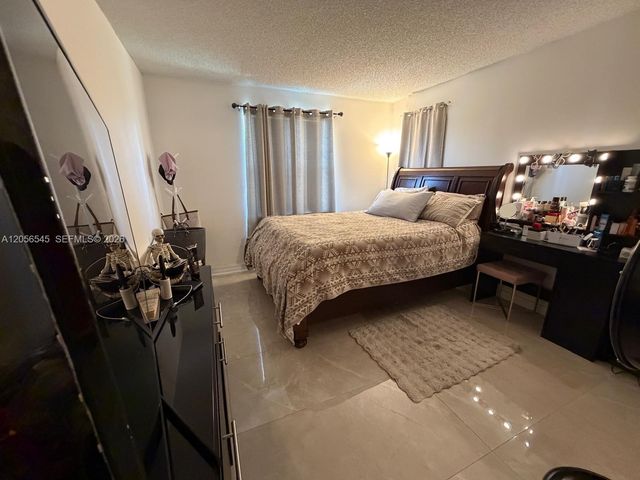 9645 NW 1st Ct 1-110, Pembroke Pines, FL 33024