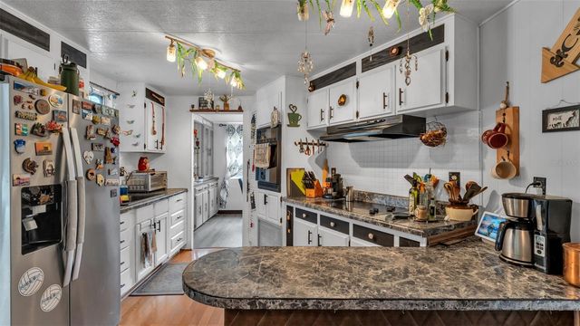 12 WOODLAND CIRCLE, Haines City, FL 33844