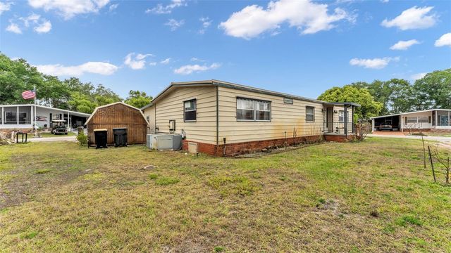 12 WOODLAND CIRCLE, Haines City, FL 33844