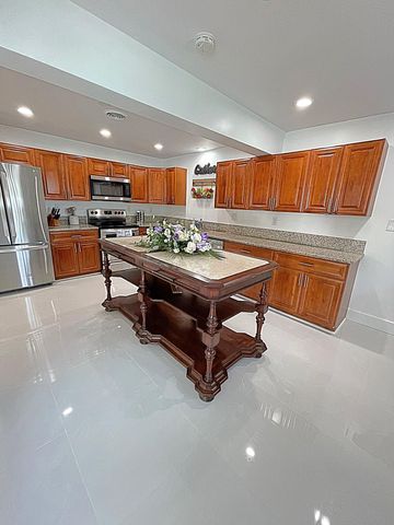 2077 Carambola Road, West Palm Beach, FL 33406