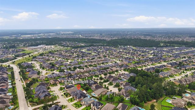 31209 Wooded Glen Lane, Spring, TX 77386