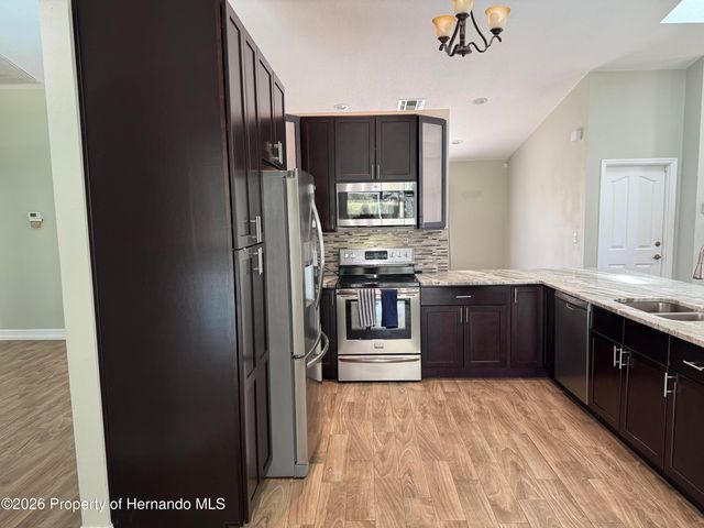 10390 Audie Brook Drive, Spring Hill, FL 34608