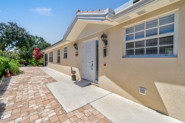 8256 SE Paurotis Lane, Hobe Sound, FL 33455