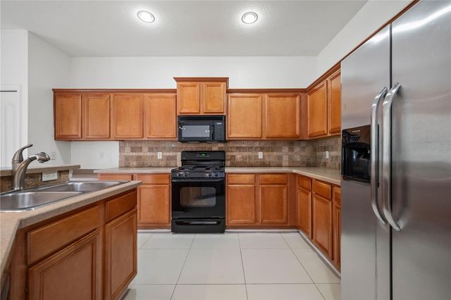 9446 LEATHERWOOD AVENUE, Tampa, FL 33647