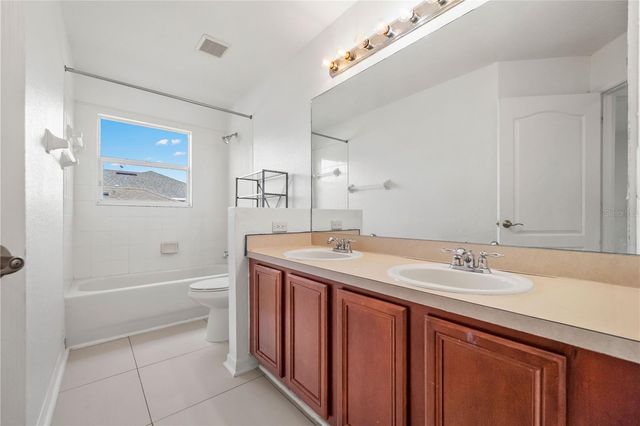 9446 LEATHERWOOD AVENUE, Tampa, FL 33647