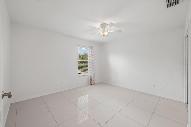 9446 LEATHERWOOD AVENUE, Tampa, FL 33647