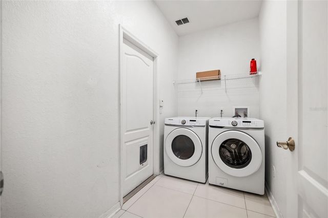 9446 LEATHERWOOD AVENUE, Tampa, FL 33647