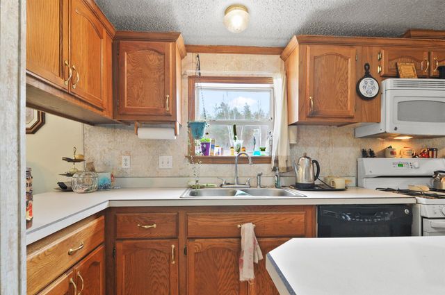 6565 N 31 Road, Greenwood Twp, MI 49663