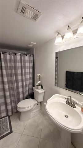 110 Lake Emerald Drive 107, Oakland Park, FL 33309