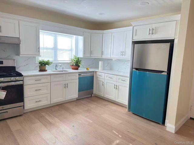 6925 69th Place, Maspeth, NY 11387